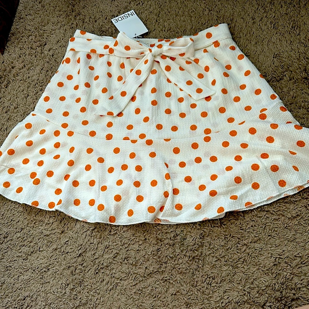 White skirt with polka dots